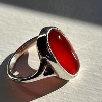 Sterling silver ring set with oval-shaped Carnelian stone